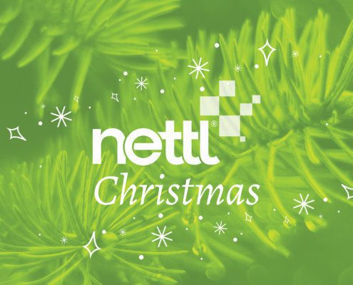 Nettl Christmas header, green overlay pine trees with christmas illustrations